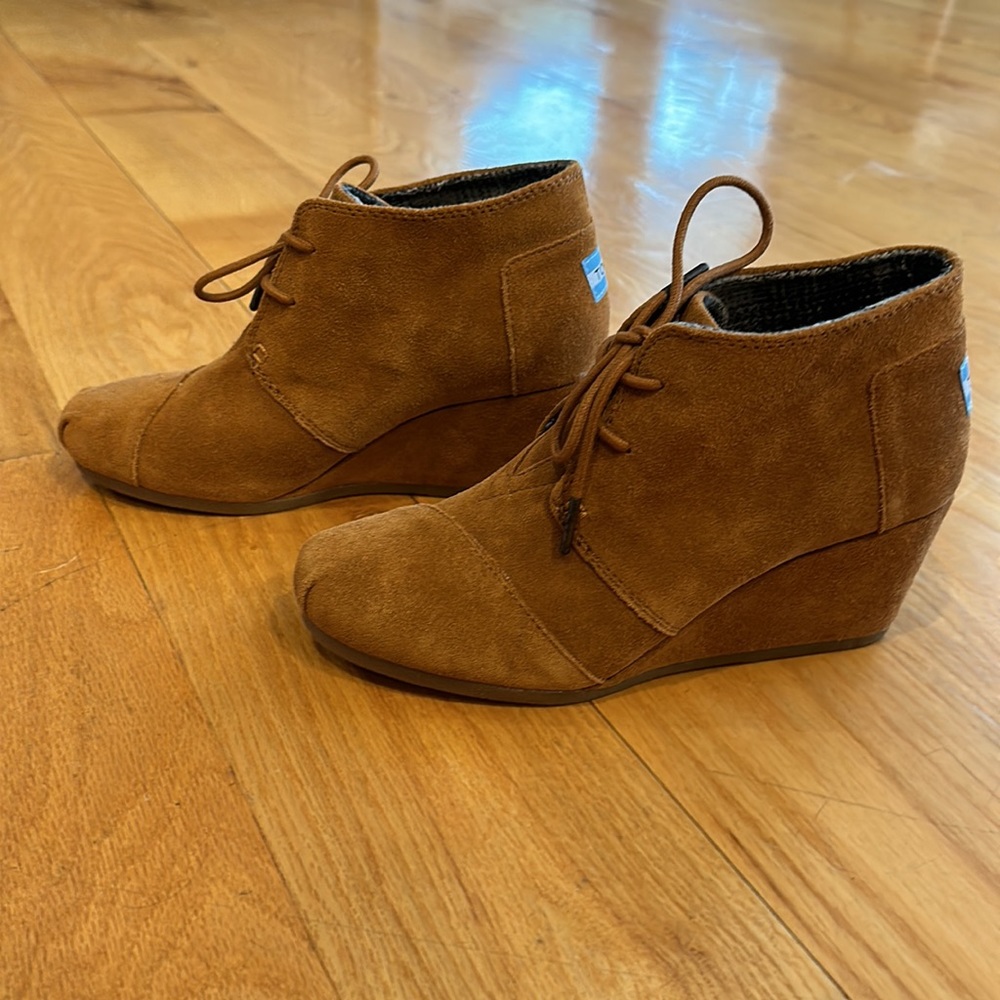 Super cute wedge booties. Never worn!